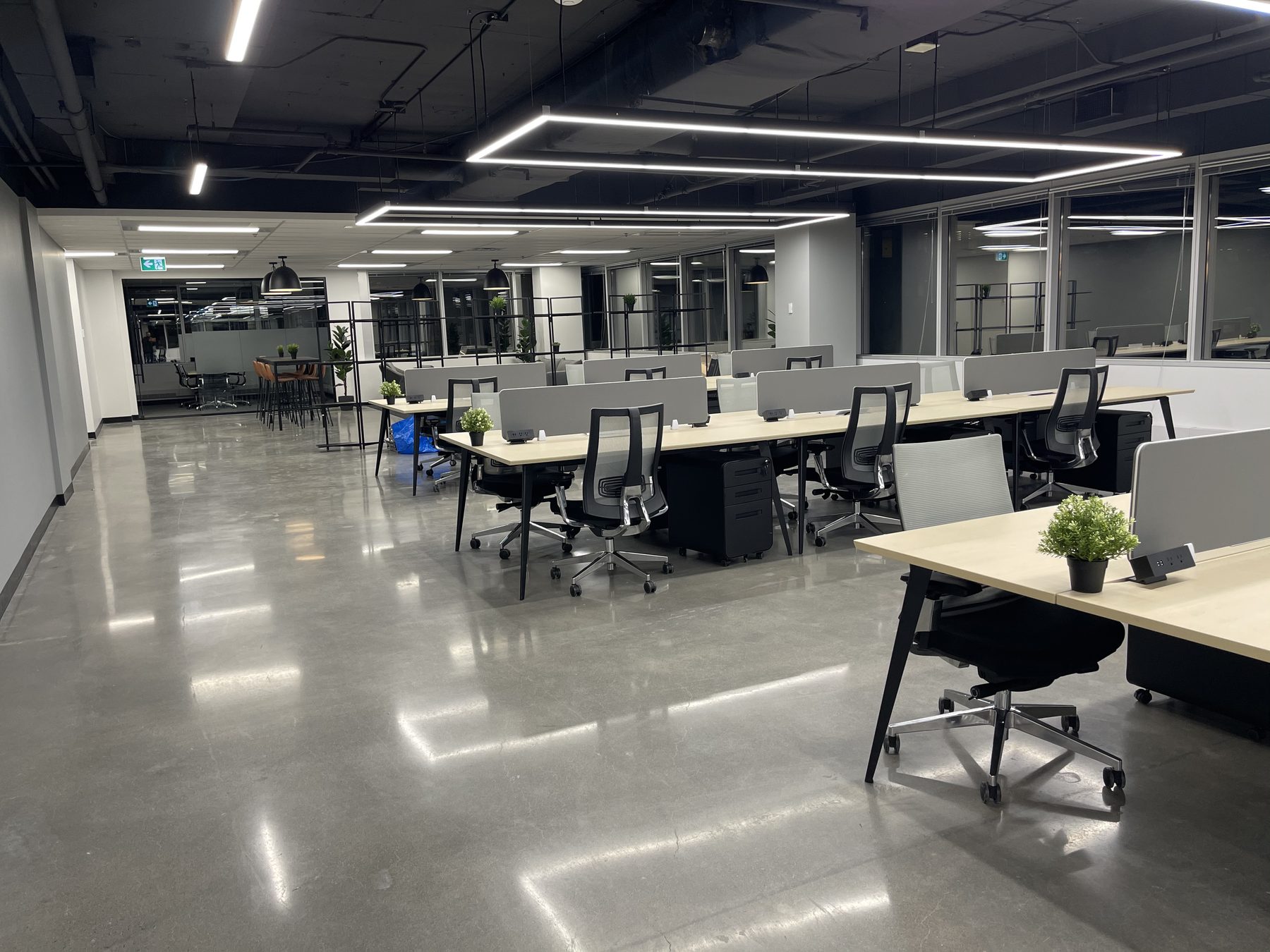 Finished open office with rows of workstations