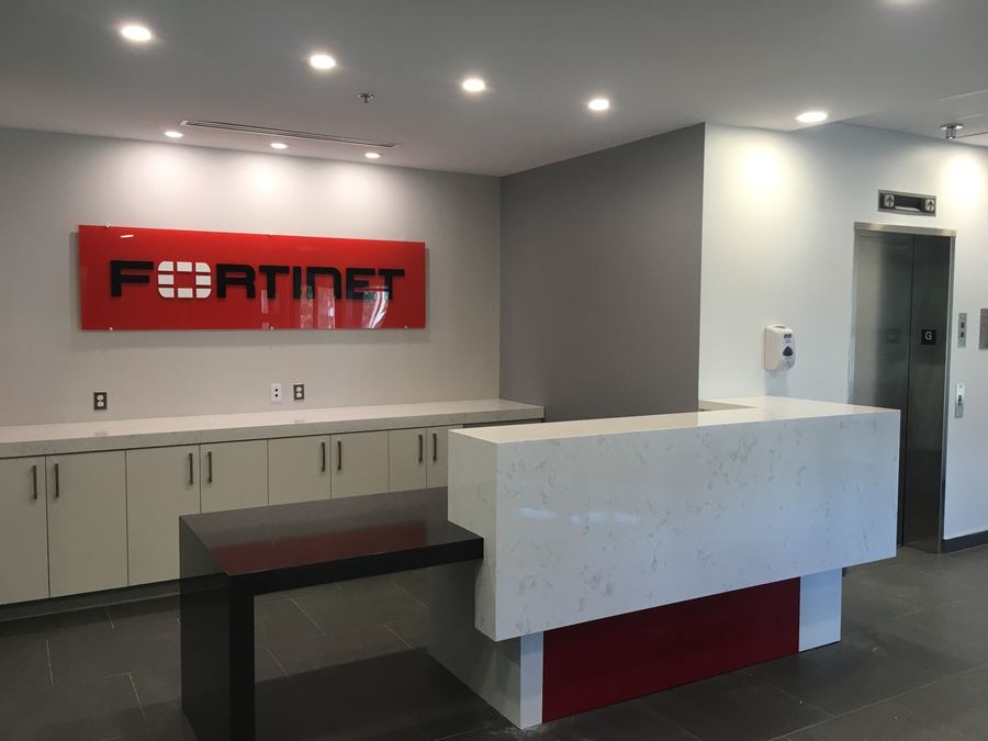 Reception Desk & Feature Wall by Kastone Construction, Ottawa