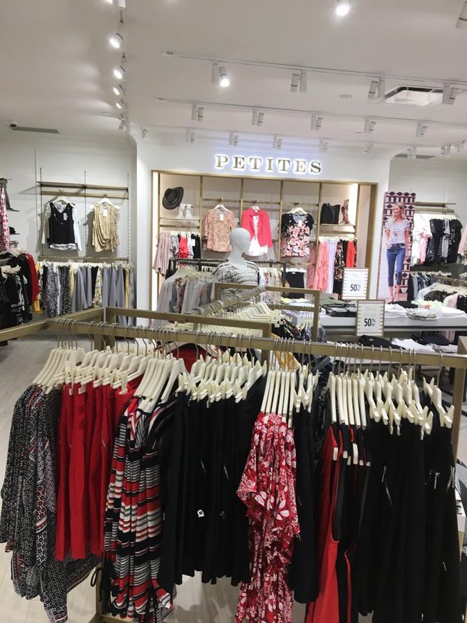 Clothing Racks & Track Lighting by Kastone Construction, Ottawa