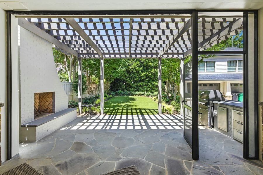Custom outdoor kitchen and pergola